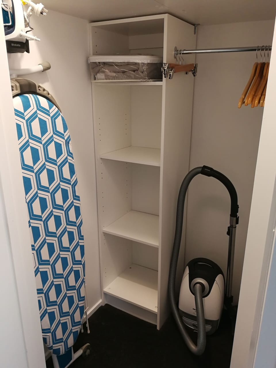 Wardrobe with ironing equipment, clothes airer etc