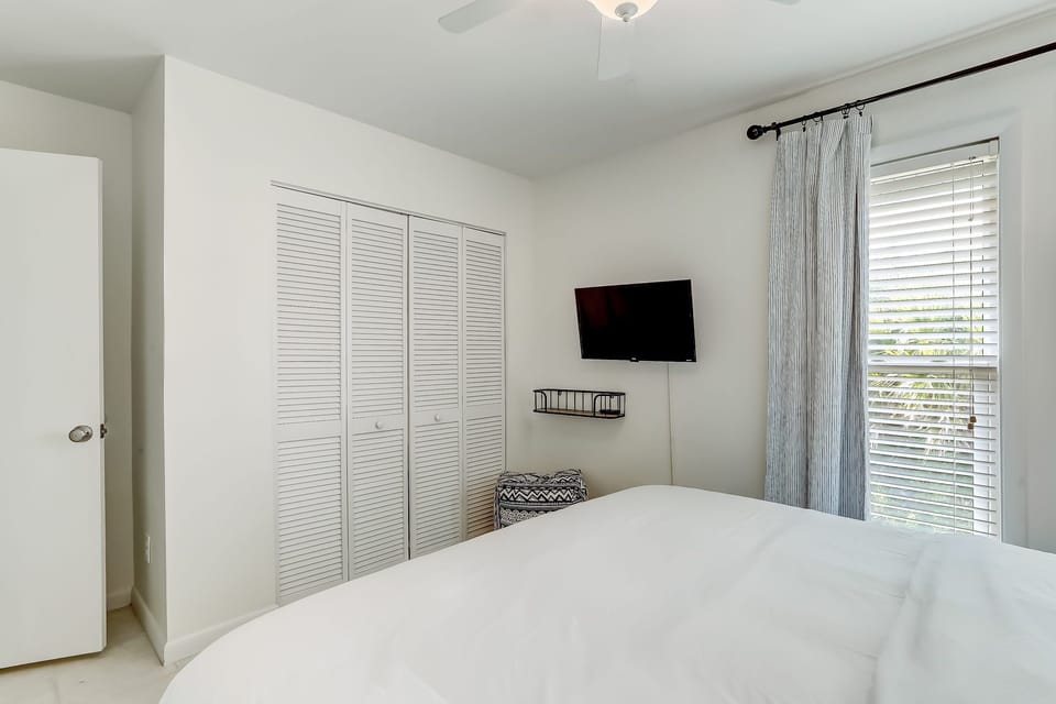 King Bed, TV and Closet Space in Guest Room #2