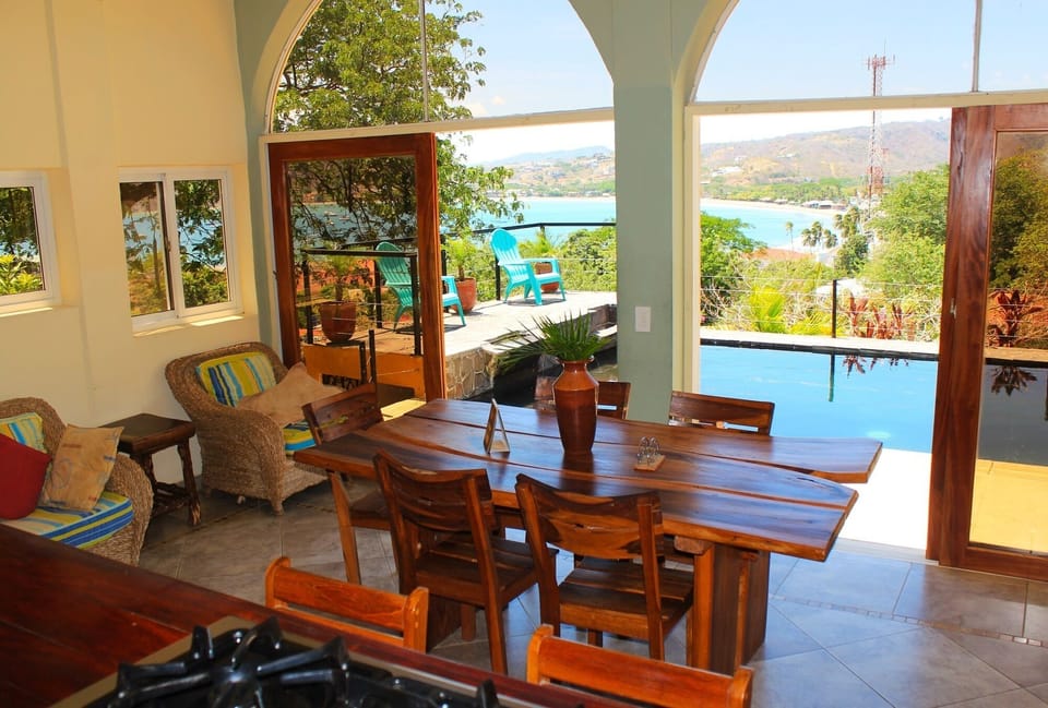 Watch the kids in the pool while in the dining or kitchen.