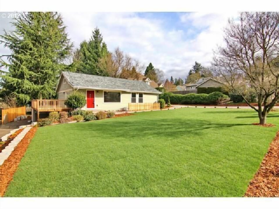 Off street parking for vehicles. Looks cozy but hides 2,200' living space