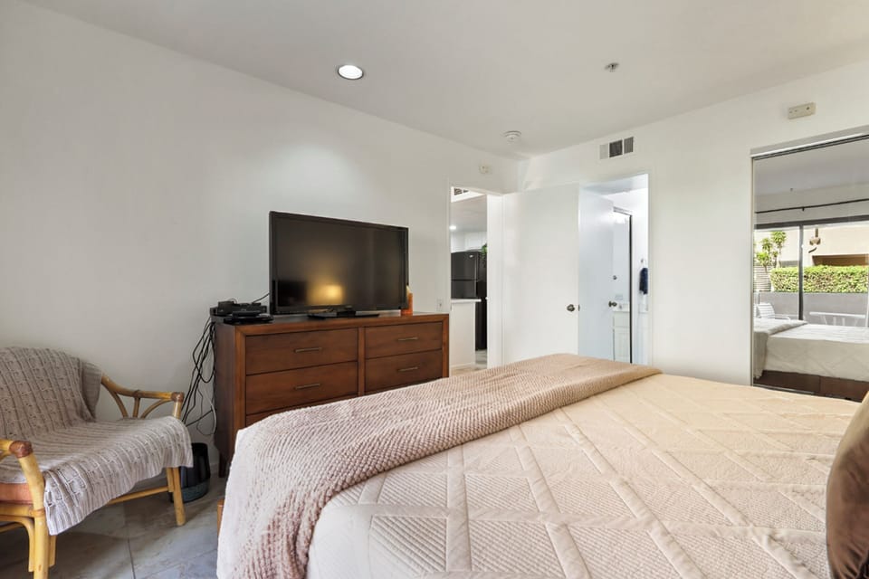 Master bedroom with king-size bed