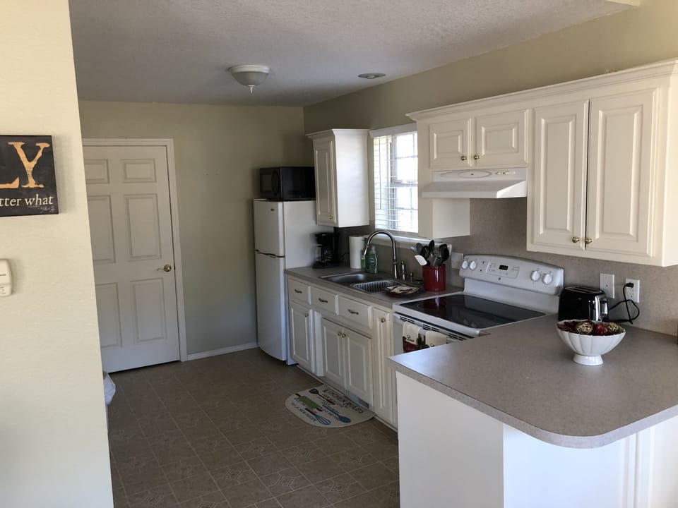 Fully furnished kitchen area.