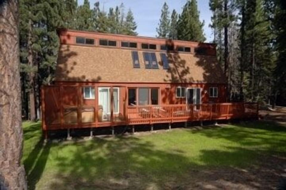 View of the Deck and Hot tub, your back yard is the forest. Not a soul in site.