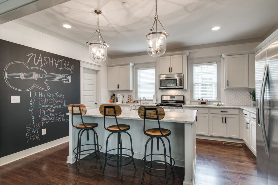 One of the kitchen walls is a chalkboard-perfect for greetings & writing plans!