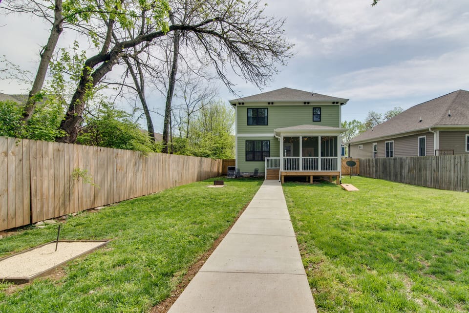 What a great yard!  It comes equipped with horse shoes and corn hole for fun!