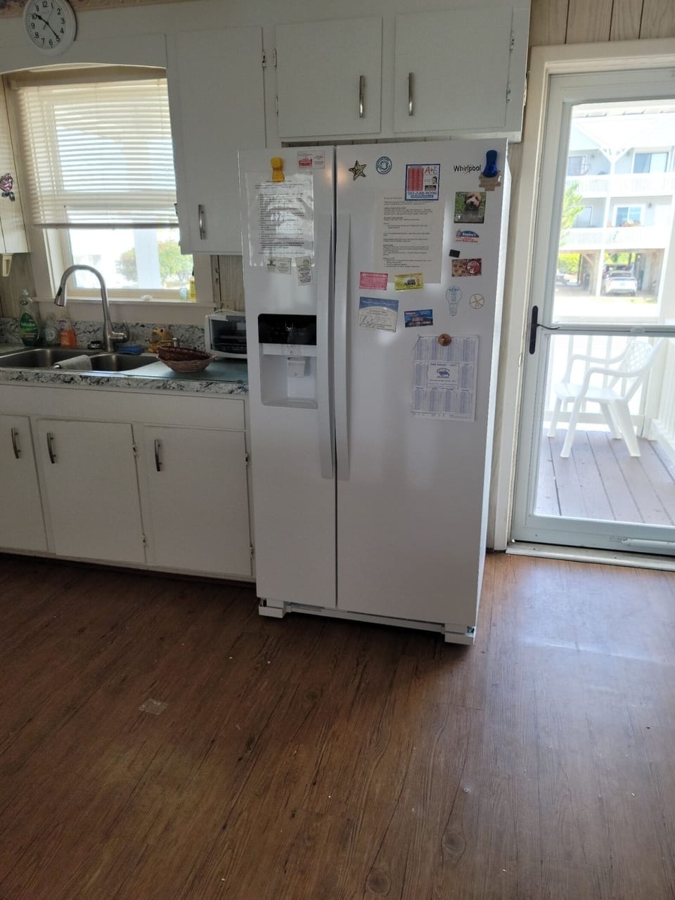 Brand new Whirpool Refrigerator in fully furnished kitchen. Installed July 2021.
