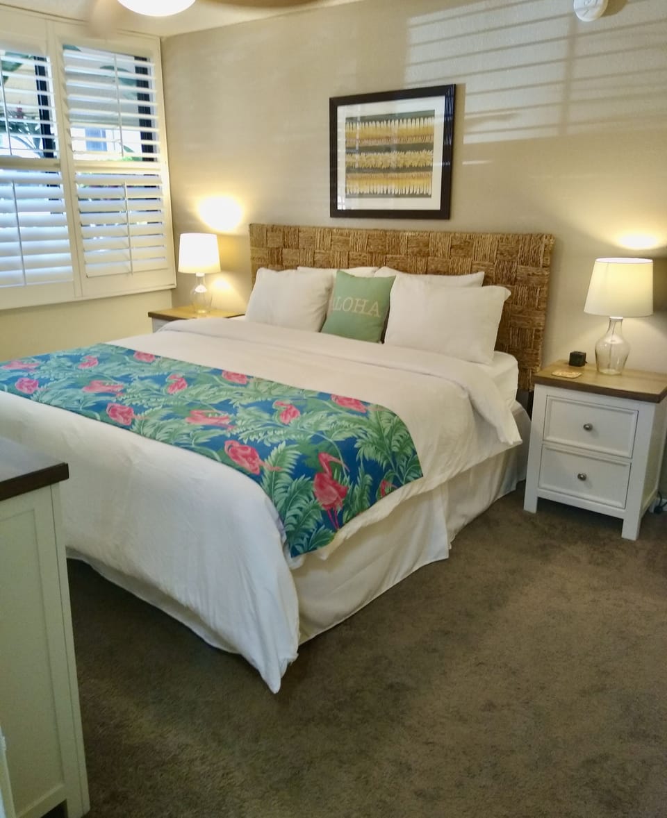 En-suite bedroom with master bath and King bed