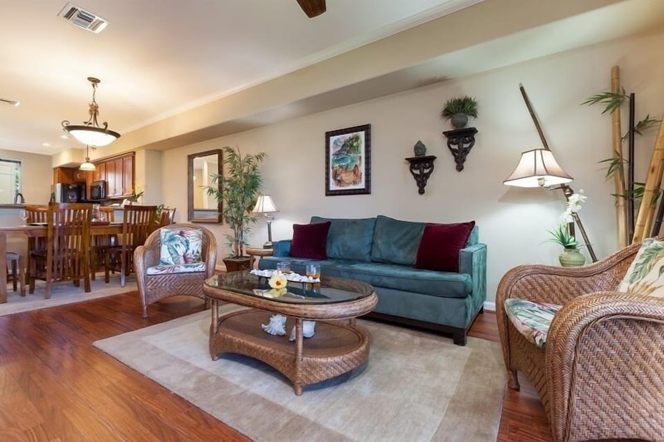 Spacious living room with slider doors to lanai