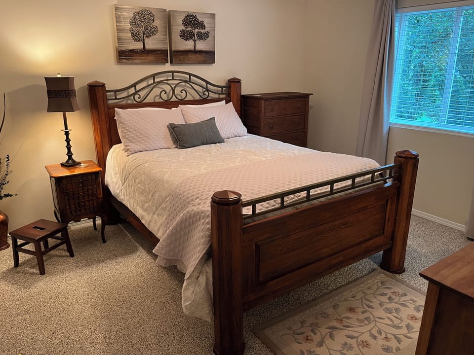 Upstairs back bedroom with queen bed