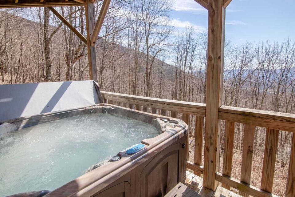 Hot Tub on Covered Deck with Seasonal View