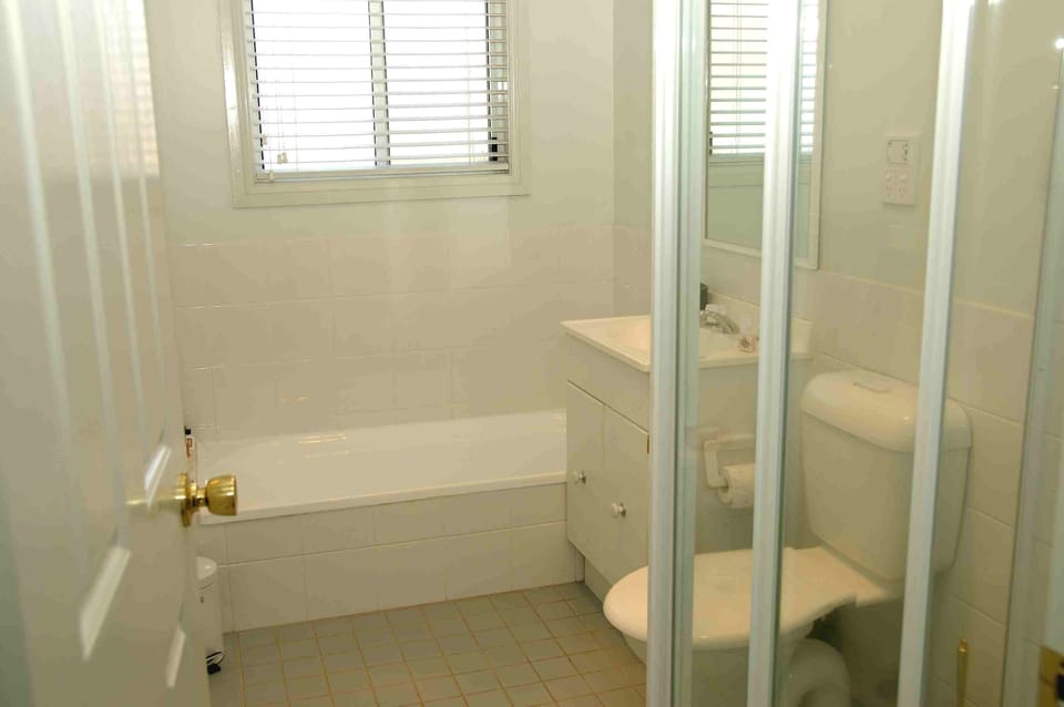 Bathroom with bath & shower