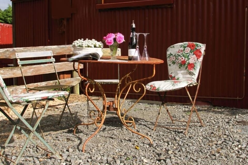 Private courtyard french wrought iron table set