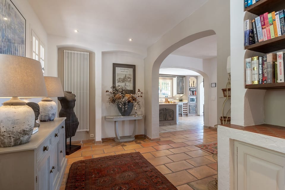 Inviting entrance hall w/library and grand piano (not pictured)