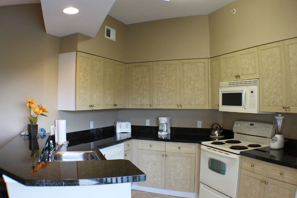 Fully Equipped Kitchen with Granite Tops
