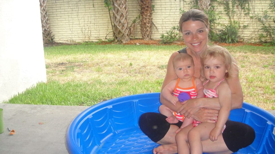 My wife & kids in the backyard.  We invite you to stay here and enjoy it too.