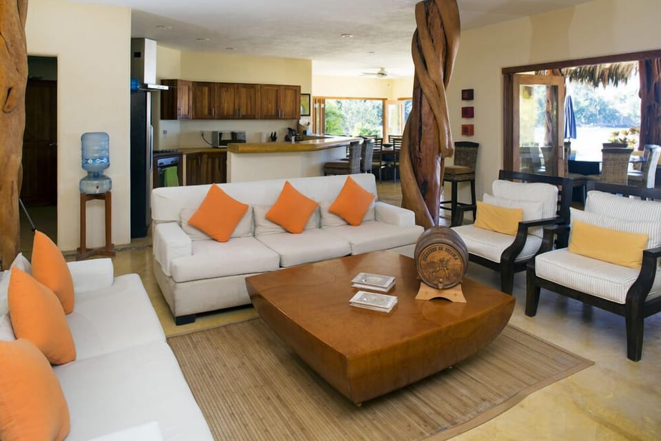 View of living room,  and owner's kitchen. There is also a cook's kitchen.