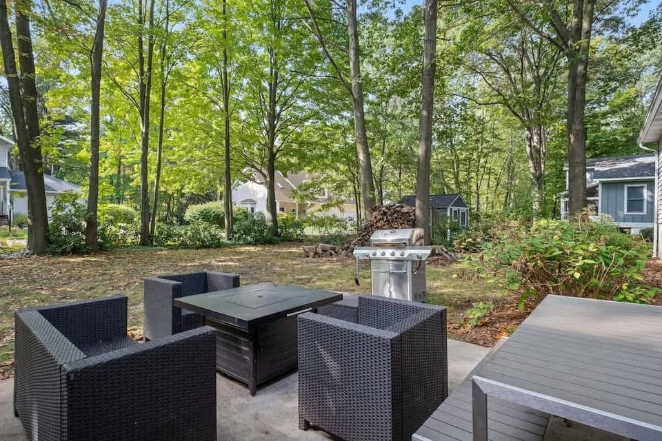 Perfect spot for grilling, dining, and enjoying nature surrounded by beautiful plants and trees.