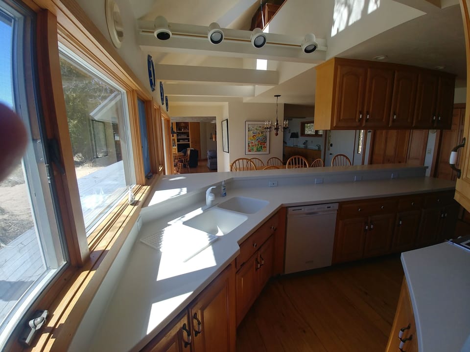View from the fully equipped Kitchen to bake, cook, grill, as your heart desires