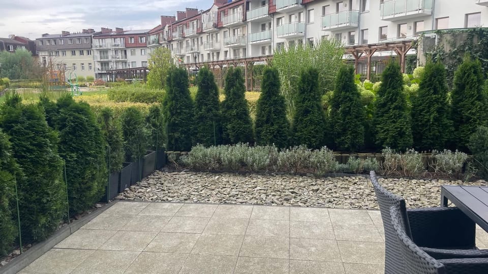 Terrace with garden furniture.