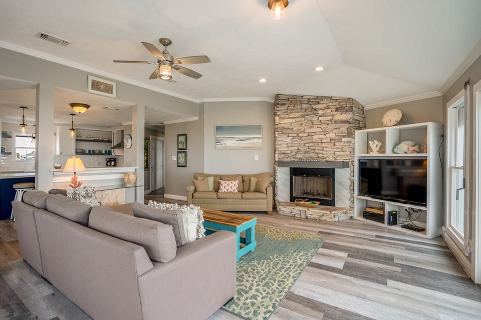 living room with sleeper sofa and TV