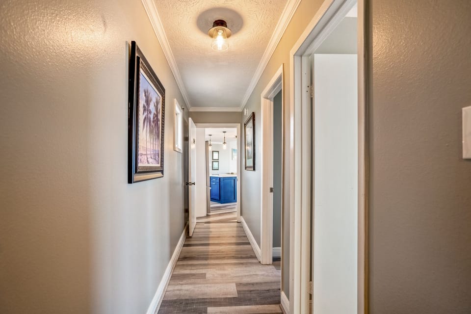 hallway from primary  bedroom to living area