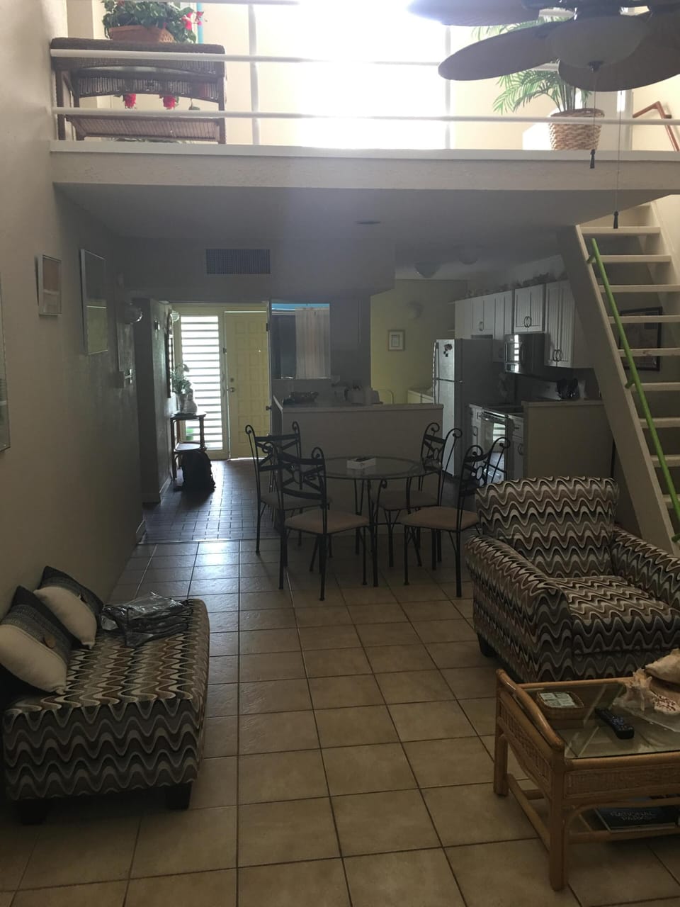 living room with loft view
