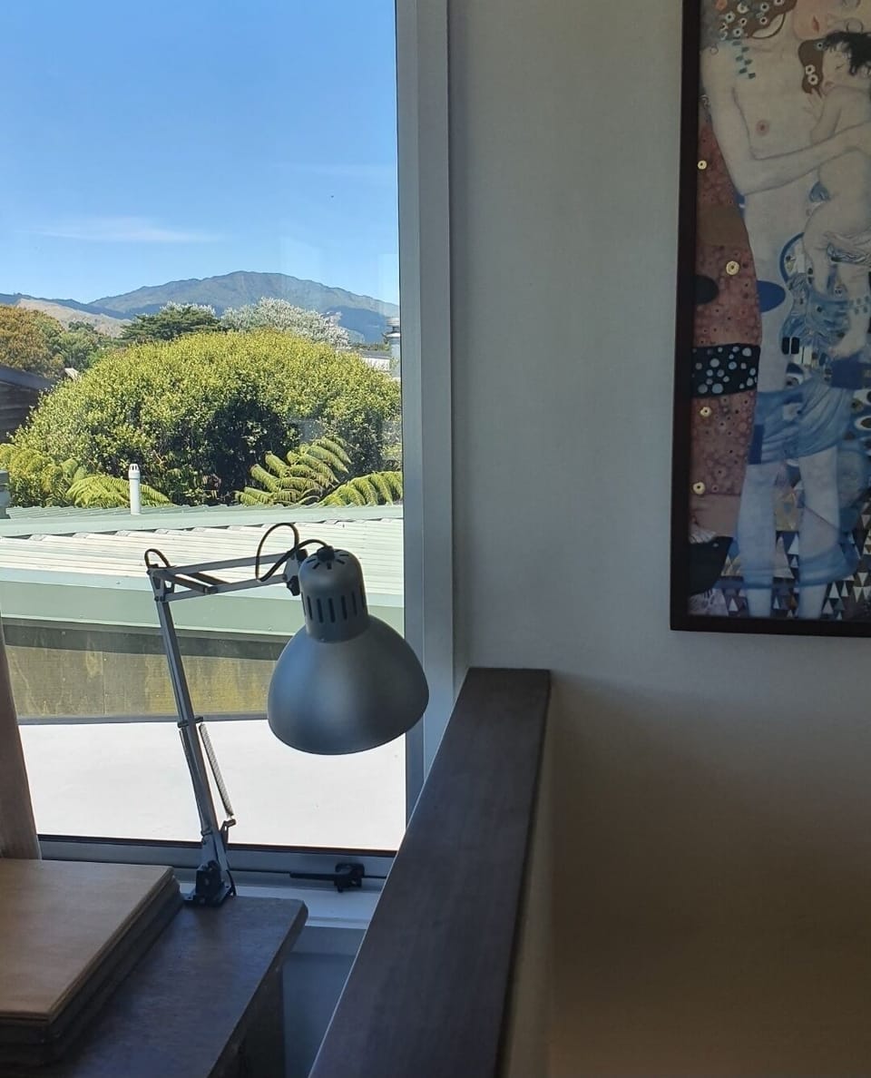 Mini 'office space' on mezzanine with view of Wainui (maunga/mountain)