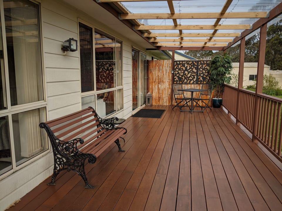 Covered deck with outdoor furniture