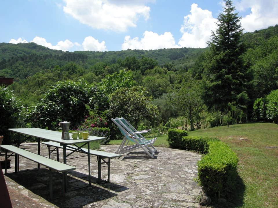 West terrace with table & benches