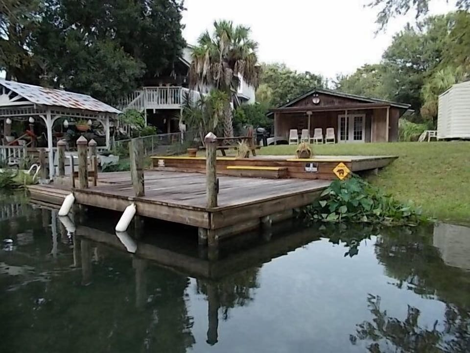 Crystal waters right outside with newly restored dock for relaxing and boating.