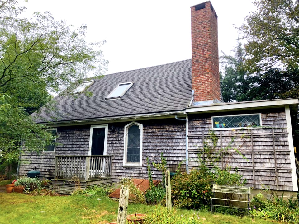 The house is located on a quiet dead-end residential street. 