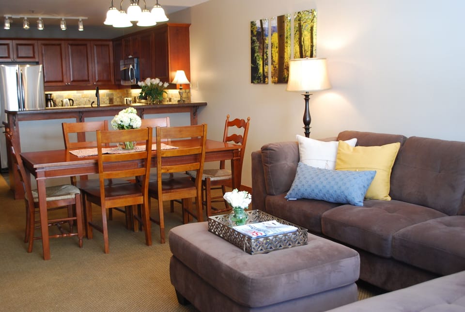 Comfortable sofa for lounging in front of large HDTV and fireplace