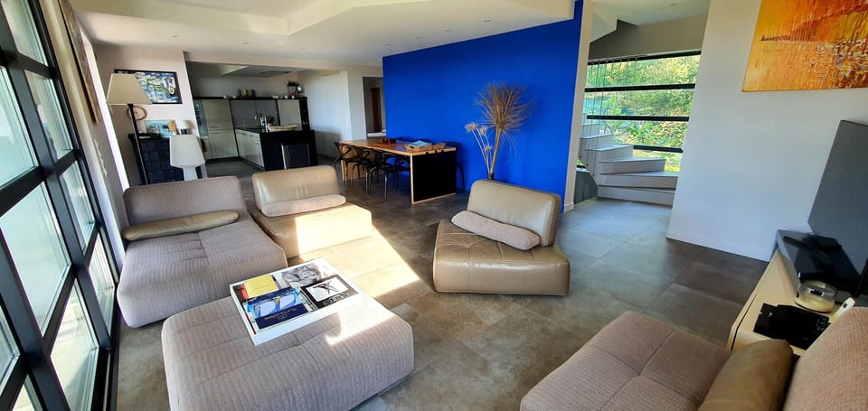 Living room with kitchen at the back