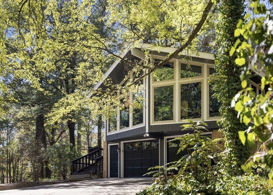 Hilltop Lodge / Front Entry Way / Concrete Parking Pad.