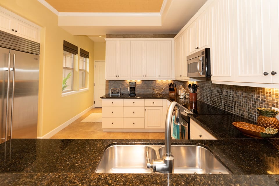 Large kitchen with Sub-Zero fridge and Miele Dishwasher. 