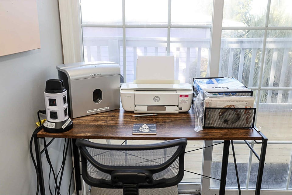 Work station with printer and shredder. 