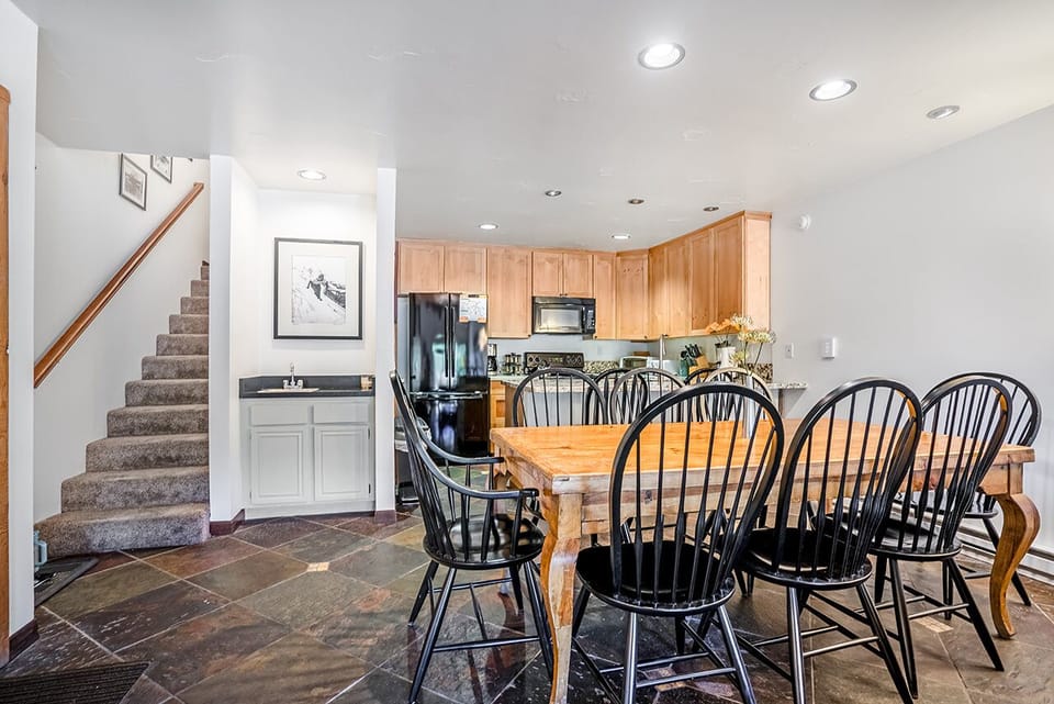Dining table seats up to 8 guests along with breakfast bar for an additional two