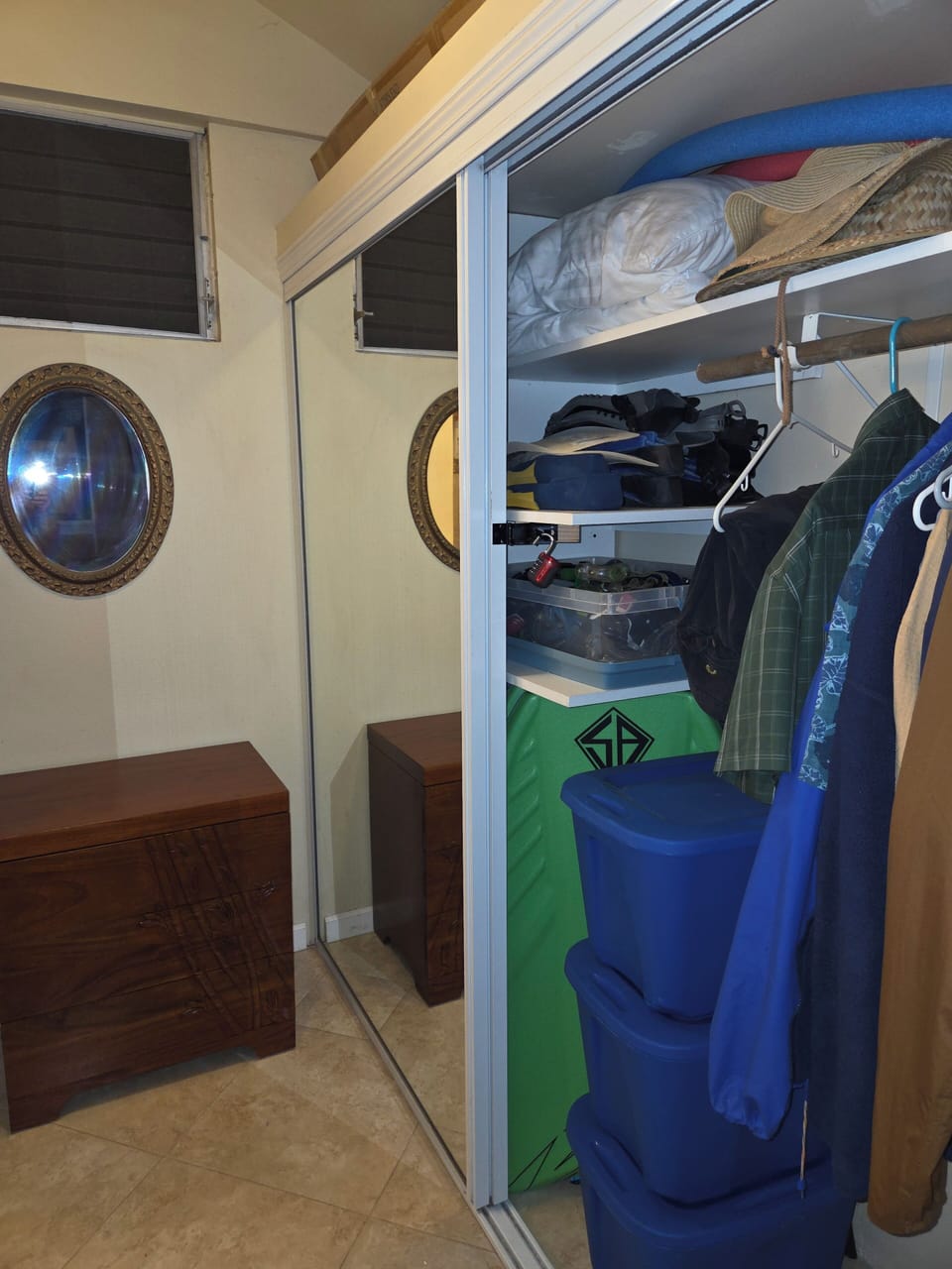 Large closet with boogie boards, snorkel gear, beach toys, pool toys