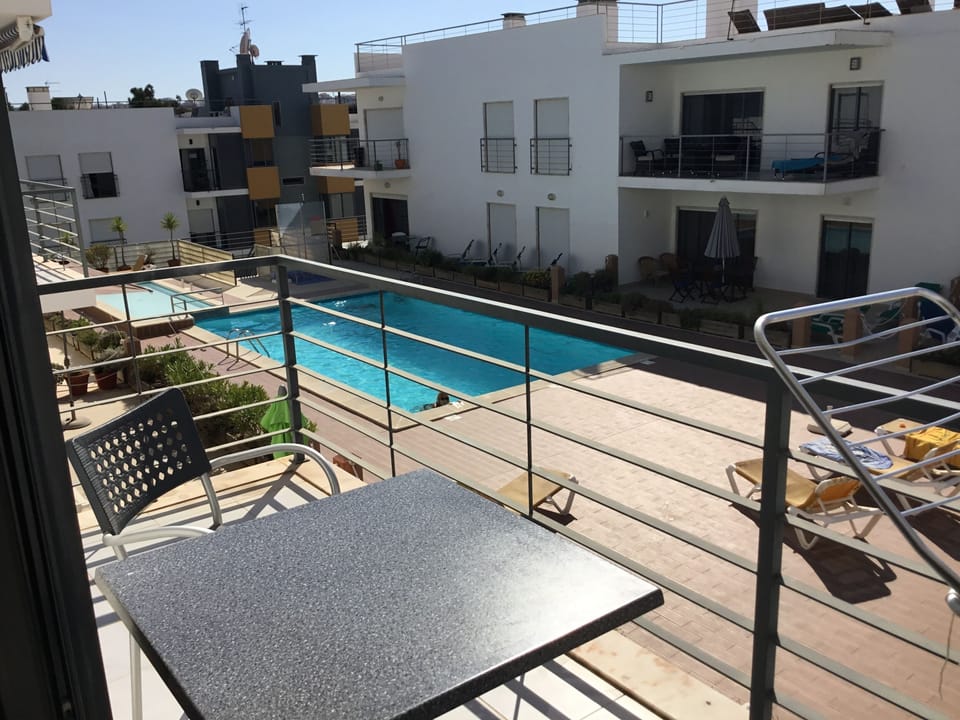View over poolarea from balcony