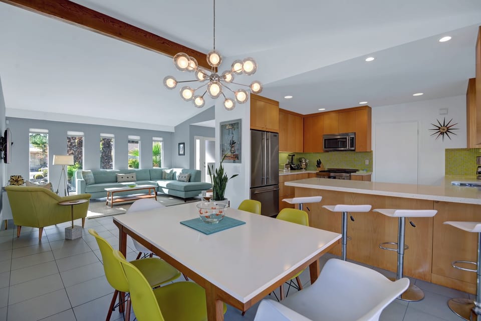 DINING ROOM REVERSE - Oranj Palm Vacation Homes.jpg