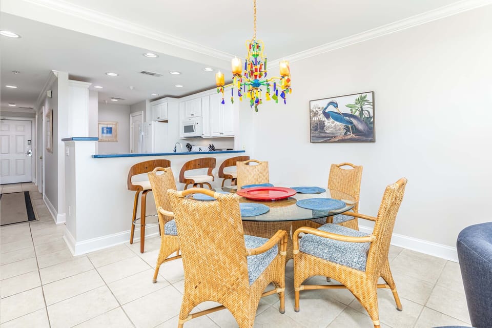 Dining table seats 5, breakfast bar seats 3