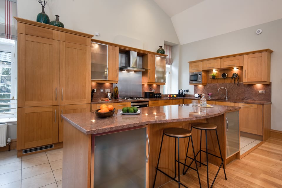 Well equipped kitchen with  breakfast seating area