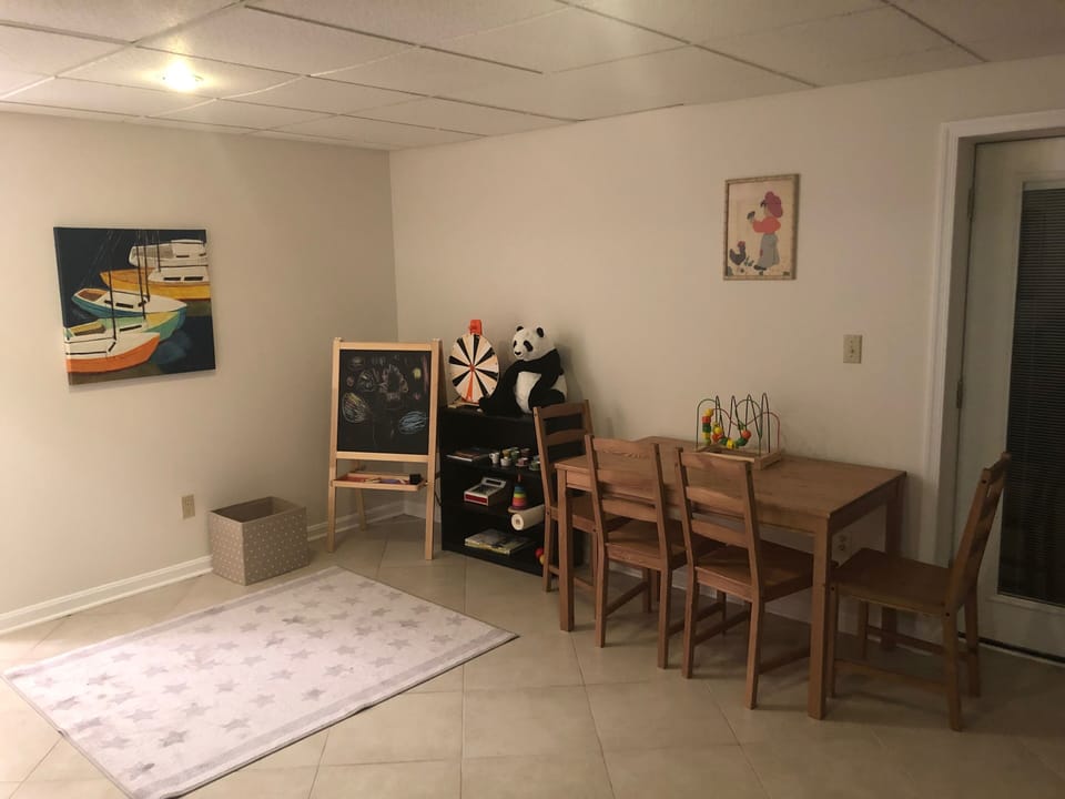 Kids play area includes trains, spin wheel, cards games, infant toys and more.