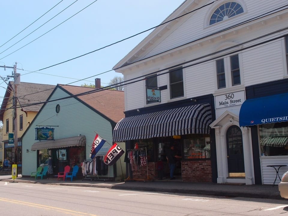 Studio is located in the rear of the green building on the left.  
