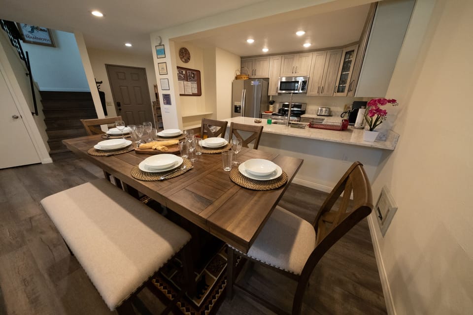 View of the dining room and kitchen! Recessed lights throughout!