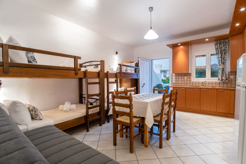 Your large bedroom with 2 bunk beds and a sofa bed 