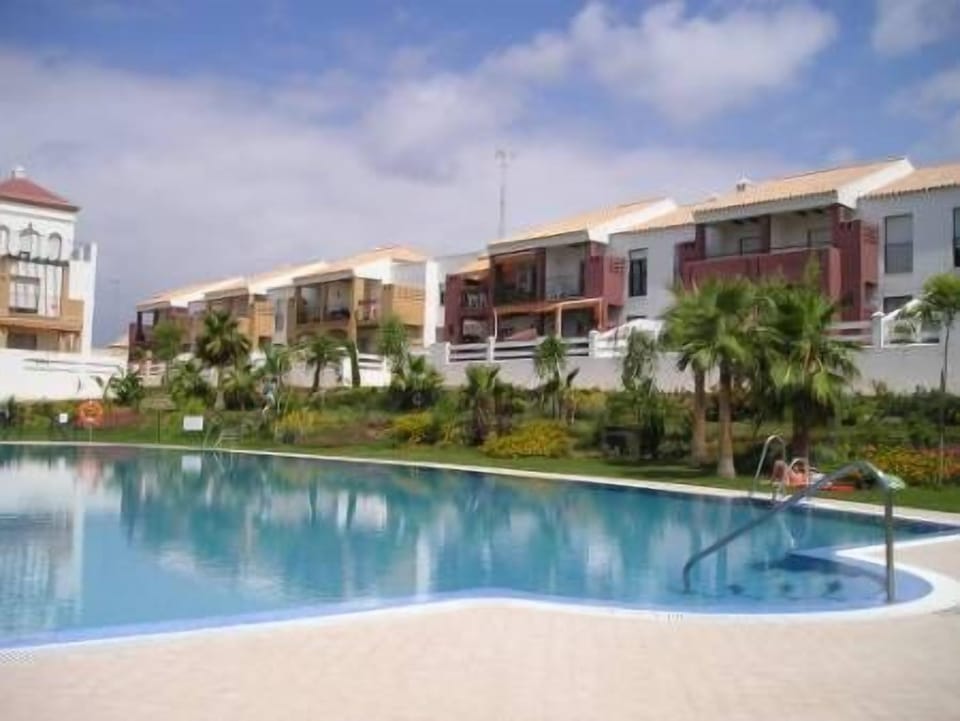 Communal swimming pool and garden area