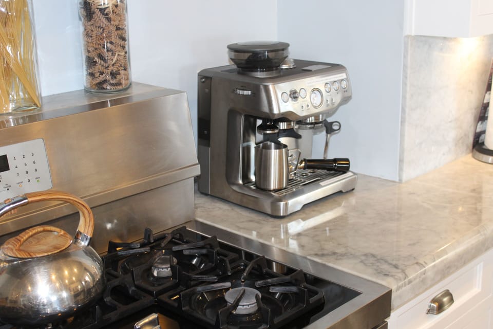 Bring your favorite bean for fresh ground esspresso or the provided grounds