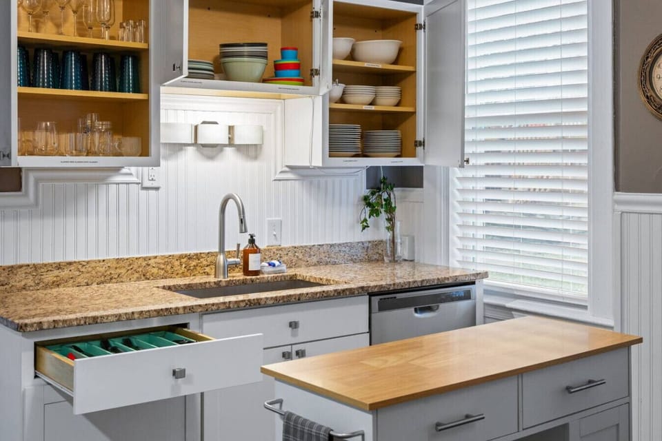 Everything in Its Place – Fully stocked for your stay, this kitchen makes it easy to cook, clean, and enjoy—from dinner plates to kids’ bowls and glasses for every occasion.