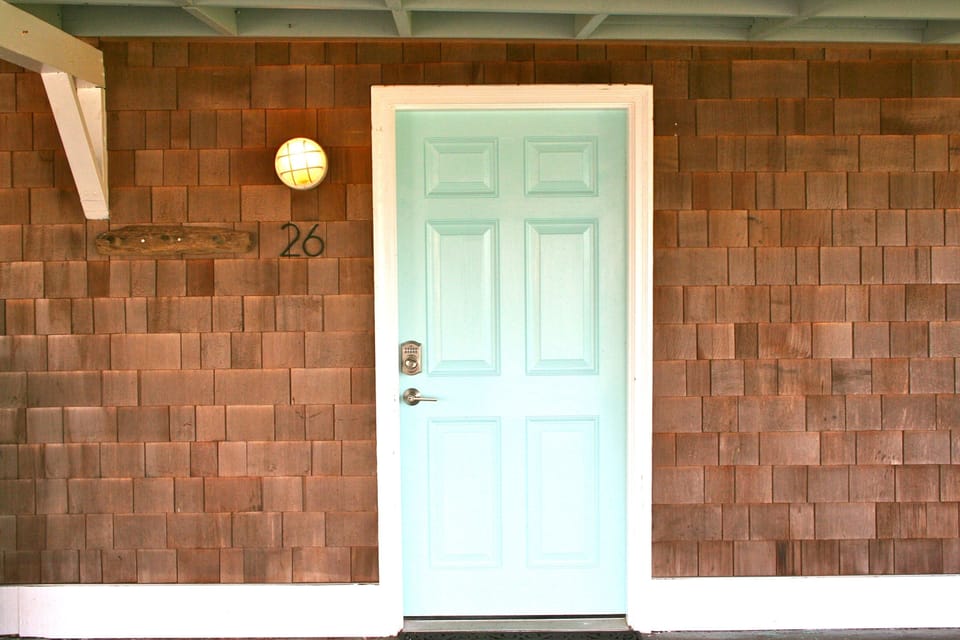 The key pad entry front door, and under cover parking for two large vehicles.